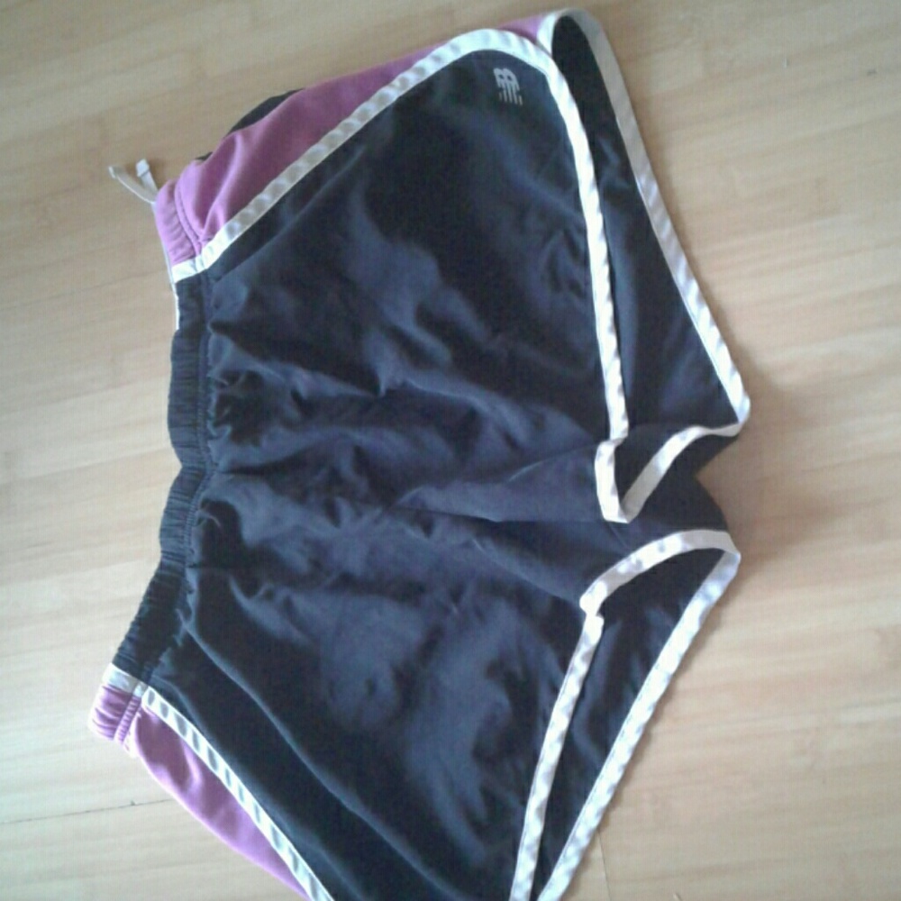 M/L New Balance running shorts